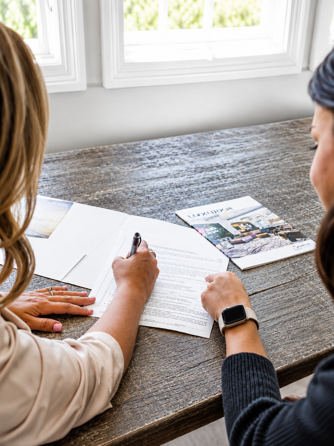 Property professionals reviewing paperwork together