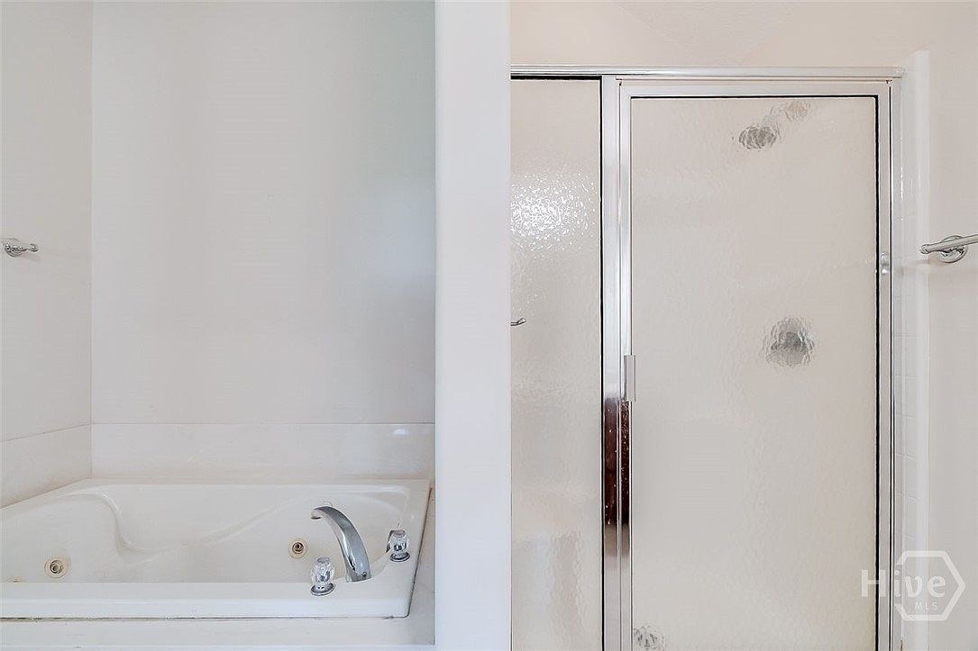 Bathroom with shower and tub at 641 Marshview Dr.